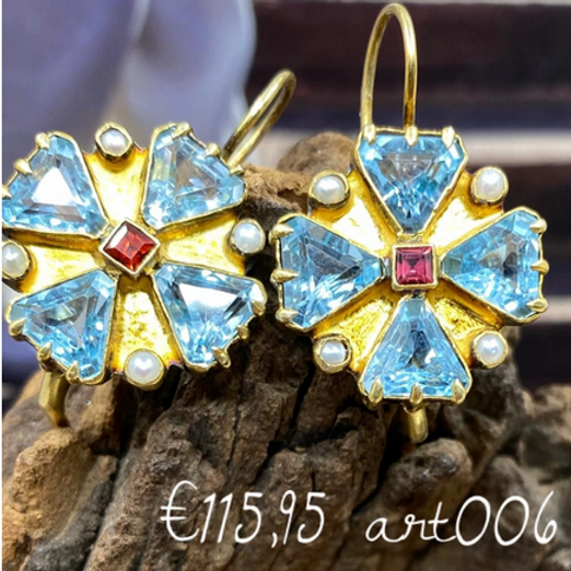 De turquoise oorbellen van Art.006